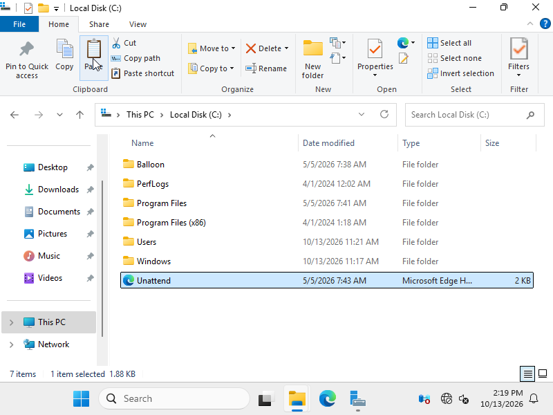The root of drive C with the pasted Unattend file